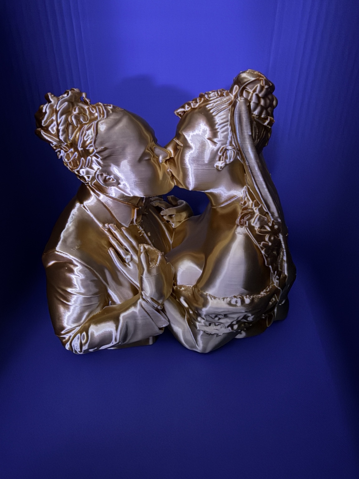 Gold custom 3D printed couple sculpture